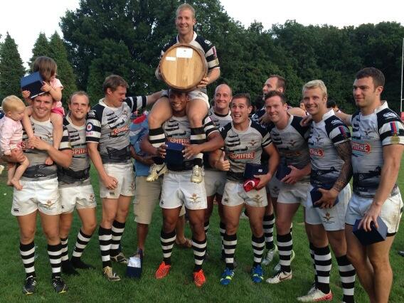 Rory Wood is lifted by his Spitfire team mates with the National Pub 7s Barrel. © RAF Spitfires / Twitter