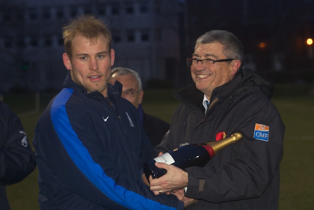 Jean-Claude hands tonights CS player Sam Laird the man of the match champagne at last season's Navies match.  I hope he saved some for last night.
